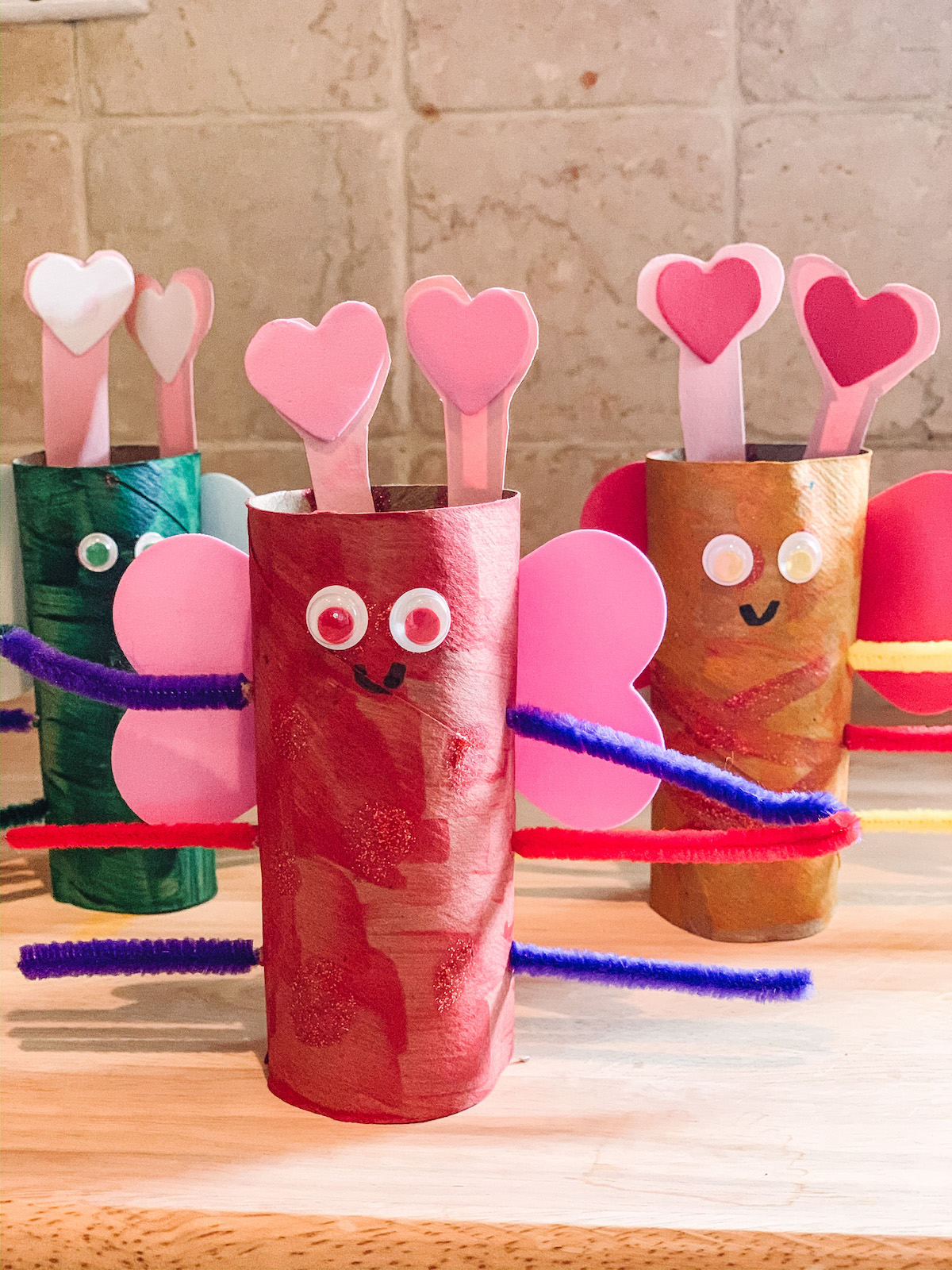 Valentine Lovebugs- construction paper hearts, googly eyes, craft